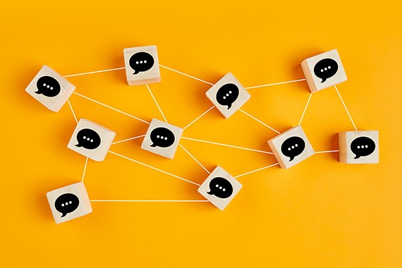 A series of interconnected speech bubbles symbolizing networking.