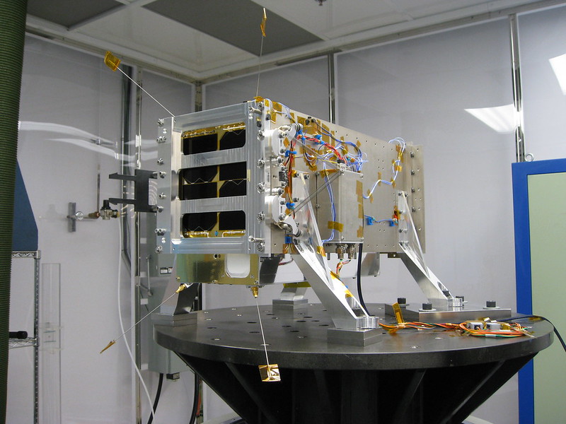 A satellite the size of a microwave on a table