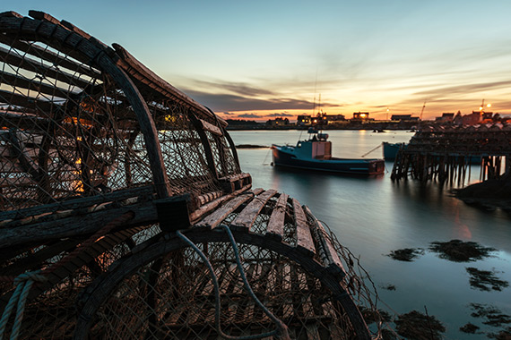 Fishing port and lobster traps at sunrise.