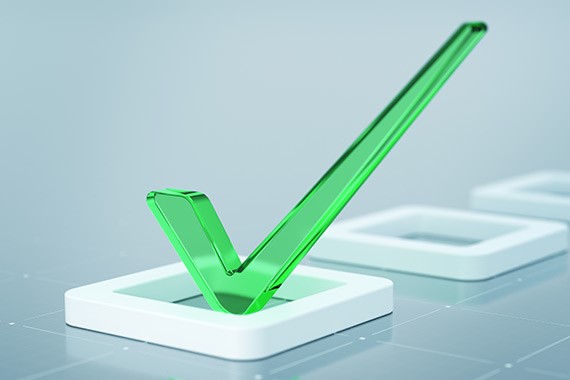A box checked with a green “v” with a glass-like appearance evoking a line in a questionnaire.